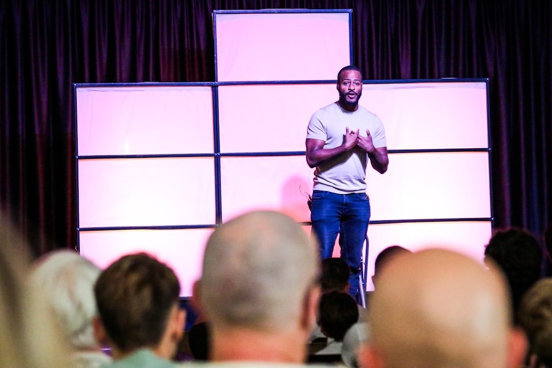 confident speaker on stage