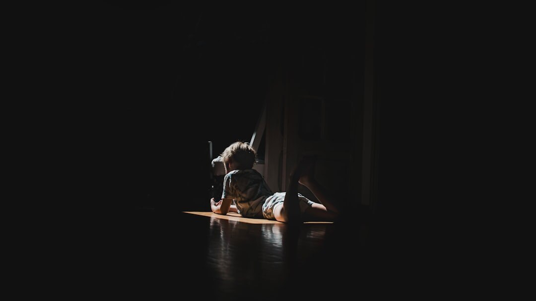 person meditating in quiet room